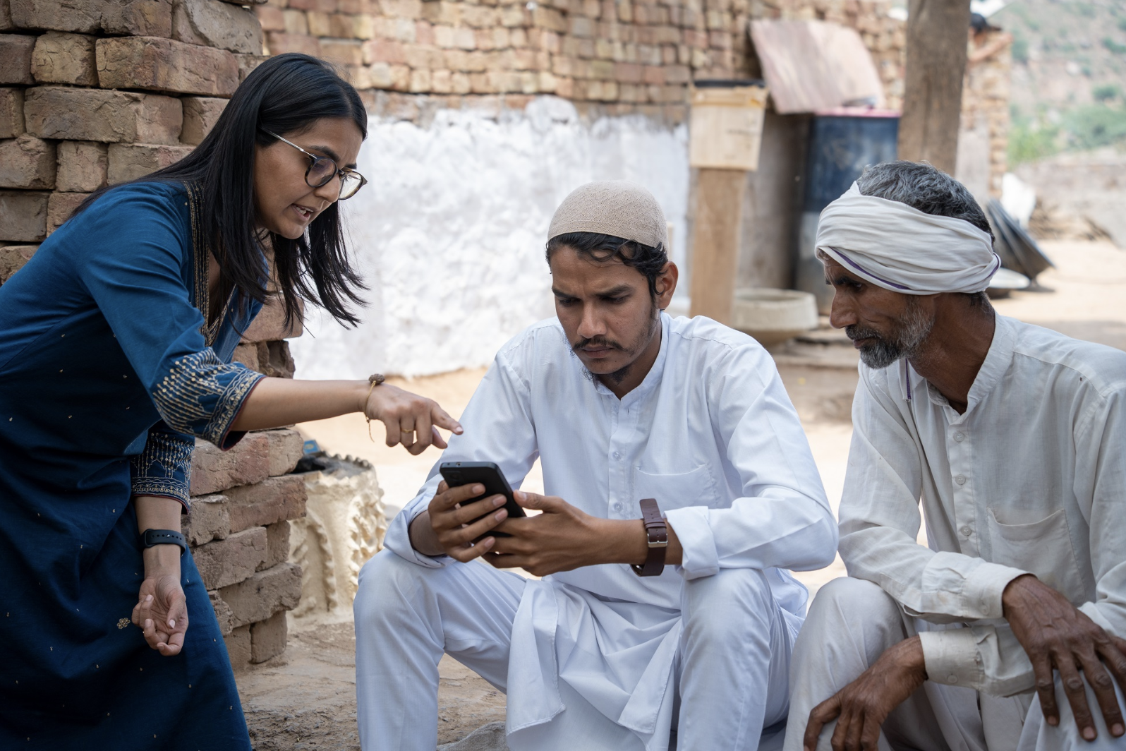 Smita Gupta working with people in the field